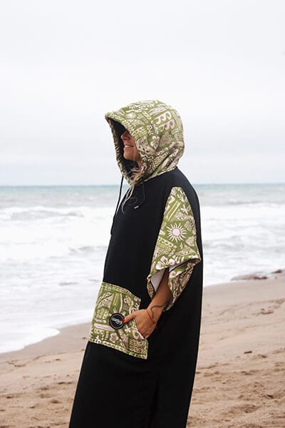 Poncho Grins Surf